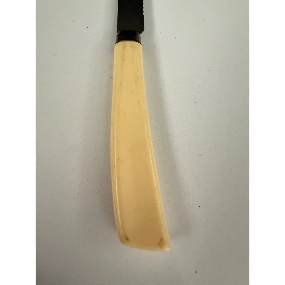 Vintage Quikut Stainless Steel Serrated Steak Knife USA Cream Handle Cutlery